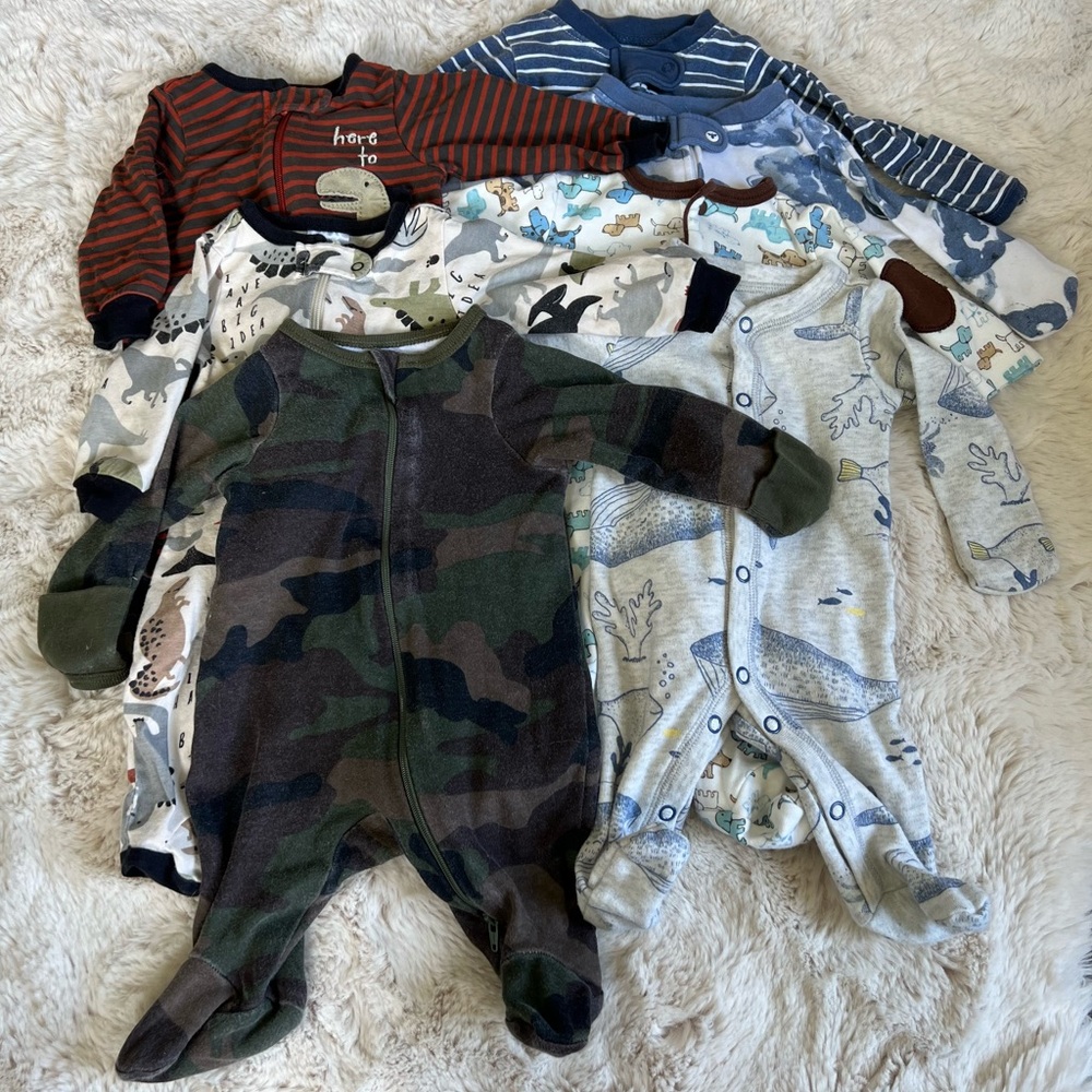 Seven Newborn Footed Pajamas one matching hat with ears
